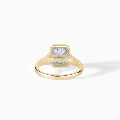 9x7mm Emerald Cut Moissanite Engagement Ring: Silver Bezel Split Shank Design