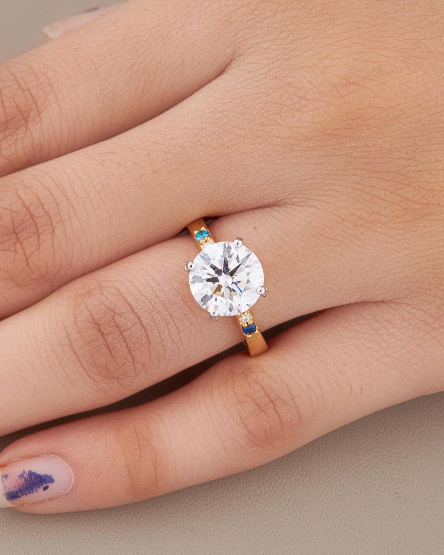 Round Cut Moissanite Engagement Ring in Yellow Gold | Minimalist Solitaire with Blue Sapphire Accents | Dainty Unique Wedding Ring for Her